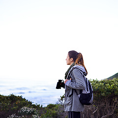 Image showing Woman, mountain view and binoculars for nature trekking hike for holiday exercise, explore or journey. Female person, workout and walking on hikking path for healthy sport, backpacking or adventure