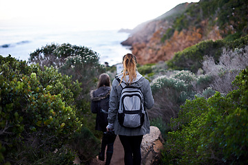 Image showing Women, friends and hiking mountain or adventure environment for holiday vacation, trekking or backpacking. Female people, back and explore walking for healthy training or outdoor, exercise or bush