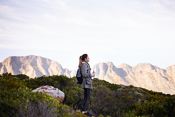 Image showing Woman, hiking and mountain view for outdoor journey for adventure trekking, exercise or backpacking. Female person, fitness and healthy sport for weekend workout in Australia, training or environment