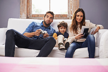 Image showing Family, controller or video game to relax, technology or sofa on metaverse, esports or bonding. Man, mama or child on couch, remote or gaming as excited, virtual or competition or play console