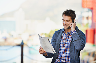 Image showing Cellphone, newspaper and man in outdoor for hiring, interview or phone call. Newsletter, happy and male person with smartphone for recruitment, conversation and discussion for employment opportunity