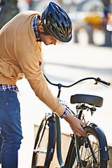 Image showing City, travel and man with bicycle for adventure, sightseeing and journey on weekend vacation. Holiday, bike and male person with helmet for eco friendly transport, safety and tourism in Italy