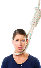 Image showing Woman, portrait and rope on neck in studio for struggle or trapped, crisis and helplessness with risk. Female person, noose and scared with fear for rescue, distress and isolated on white background.