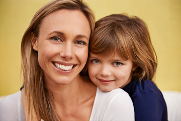 Image showing Smile, hug and portrait of mother with child bonding with positive, good and confident attitude. Happy, excited and girl kid embracing mom with love, care and support in living room at family home.