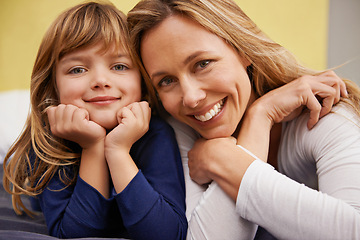 Image showing Smile, relaxing and portrait of mother with child on bed bonding with positive, good and confident attitude. Happy, excited and girl kid laying mom in bedroom at modern family home in Canada.