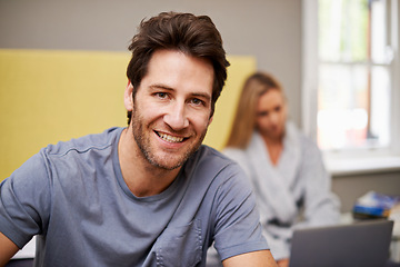 Image showing Man, smile and portrait with partner, bed and laptop for morning internet routine. Happy, couple and home with bedroom, pyjamas and robe together in house with technology for relationship and love