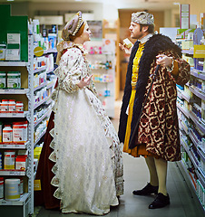 Image showing Supermarket, argument and royal couple with costume for food choice, grocery shopping or product. Convenience store, king and queen in victorian outfit for purchase, decision or customers in dispute
