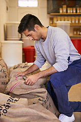 Image showing Man, factory and check with bag for coffee beans, quality assurance or thinking with product for export. Entrepreneur, caffeine and trading with organic process, manufacturing or inspection for stock