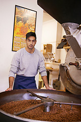 Image showing Coffee, portrait and man with machine for roasting with small business, production and quality control. Entrepreneur, barista or roaster with beans at cafe, sustainable startup and espresso process