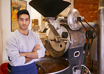 Image showing Coffee beans, roasting and portrait of man with confidence in small business, process and quality control. Entrepreneur, barista or roaster at espresso cafe, sustainable startup and arms crossed