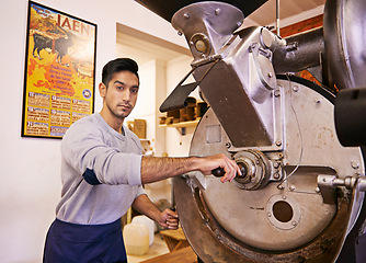 Image showing Man, machine and portrait in factory with coffee with roast, process and industrial job for export. Person, employee and tools for caffeine, beans or press with manufacturing at warehouse in Colombia