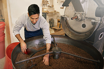 Image showing Coffee, cafe and man with machine for roasting with blending, production and quality control. Entrepreneur, barista or person with beans at small business, sustainable startup and espresso process