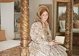 Image showing Woman, royal and book with portrait for renaissance, royalty aesthetic and reading on palace bed. Monarch, wealthy person or elegant dress for cosplay, regal or medieval knowledge in the castle