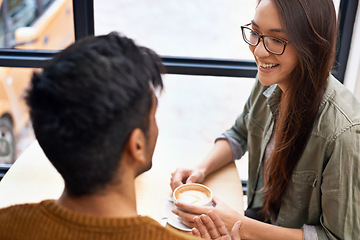 Image showing Coffee shop, happy and couple with drink talking, in conversation and chatting for bonding and love. Relax, date and man and woman with caffeine, cappuccino and beverage in restaurant, cafe and store