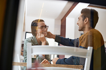 Image showing Happy couple, relax and care with date for conversation, bonding or romance at indoor restaurant. Young man and woman with smile by window at coffee shop for talking and chatting together at table