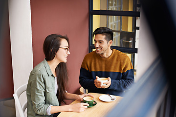 Image showing Coffee shop, date and couple relax with drink in conversation, talking and chatting for bonding. Love, happy and man and woman with caffeine, cappuccino and beverage in restaurant, cafe and store