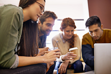 Image showing Creative team, meeting and planning with laptop at cafe for group discussion or project. Happy people, employees or young friends with technology for brainstorming or startup at coffee shop or lounge