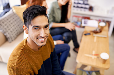 Image showing Restaurant, business people and portrait of man in meeting, discussion and conversation for ideas. Teamwork, creative agency and men and women in cafe for brainstorming, planning and collaboration