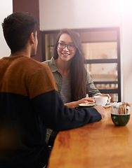 Image showing Coffee shop, love and couple on date with drink in conversation, talking and chatting for bonding. Relax, happy and man and woman with caffeine, cappuccino or beverage in restaurant, cafe and store