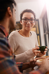 Image showing Couple, date and coffee shop with woman and talking together with hot drink in a cafe. Relationship, smile and mug with discussion and chat in a restaurant with tea or cappuccino at a table