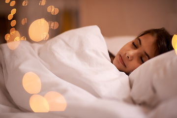 Image showing Sleeping, peace and girl child relax in a bed with comfort, dreaming or resting at home. Sleep, dream or calm female kid person in a bedroom for vacation, holiday or nighttime quiet snooze in a house