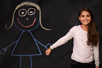 Image showing Blackboard, children or girl holding hands with art, drawing or picture of imaginary friend on dark background. Fantasy, creative or kid person with chalk sketch, dream or school homework assignment