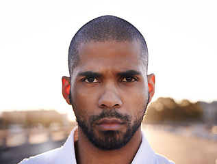 Image showing Man, serious and portrait in street for fitness with health, closeup and headshot for training outdoor. Person, athlete and ready for workout, exercise and wellness with sports on metro road in city