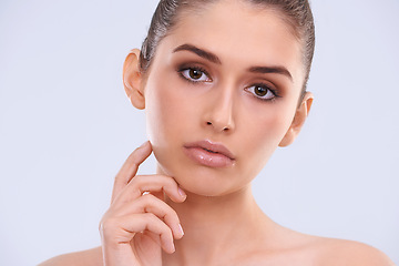 Image showing Beauty, skincare and portrait of woman with serious face, confidence and benefits of cosmetics in studio. Dermatology, health and girl with natural makeup, glow and skin care on white background