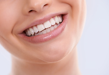 Image showing Teeth, mouth and woman with smile for dental, health and orthodontics with skin on white background. Oral hygiene, closeup for wellness and happy with veneers, dentist treatment and shine in studio