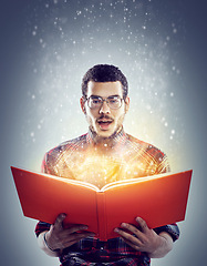 Image showing Man, book and read for story, fairytale and wow facial expression for glowing and sparkle on mockup. Young person and shocked with glasses for omg, surprised and interesting for magic and fiction