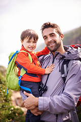 Image showing Father, child and hiking portrait with smile, backpack and travel with happy and support in nature. Kid, adventure and mountain with love, trust and bonding with family and journey for holiday