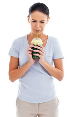 Image showing Woman, green smoothie and drinking or unhappy in studio, nutrition and raw herb taste on white background. Female person, diet and milkshake for weight loss or detox, minerals and disgusting fiber