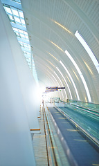 Image showing Airport, building and design with interior and window in futuristic architecture for travel, aircraft and flight. Modern urban and editorial with walls for movement, destination and travelers