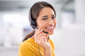 Image showing African woman, smile and headset in portrait talking and helping customer in call center. Professional consultant, connect and communicate on landline support, advise and answer questions for client