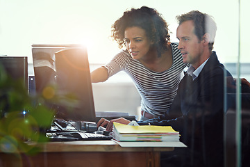 Image showing Business team, collaboration and computer check with web design, advice and mentor in office. Website, help and employee at a desk with tech and conversation for digital project at creative agency