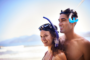 Image showing Scuba diving, happy or couple on holiday at a beach to explore for marine adventure, hobby or vacation activity. Mask, divers or people at an ocean for travel, tropical environment or outdoor nature