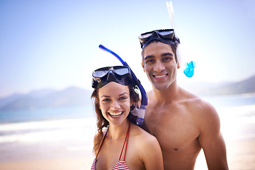 Image showing Scuba diving, portrait or couple on holiday at sea to explore for marine adventure, hobby or vacation activity. Mask, divers or people at a beach for travel, tropical environment or outdoor nature