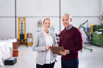 Image showing Checklist, teamwork or portrait of people in warehouse for stock in workshop, supply chain or production. Woman, clipboard or happy managers in factory for industrial process, inspection or resources