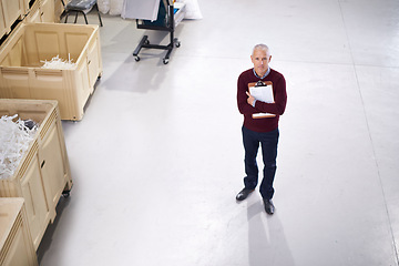 Image showing Top view, checklist or portrait of man in factory inspection for stock in a plant, supplier or production. Manufacturing, clipboard or manager on warehouse floor for plastic, logistics or resources