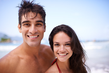 Image showing Happy, beach and portrait of couple on vacation, adventure or holiday for romantic travel. Smile, love and young man and woman on date by ocean or sea for tropical outdoor anniversary weekend trip.