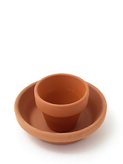 Image showing Empty Orange Gardening Pots and Tools