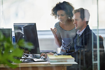 Image showing Business team, collaboration and computer with web design, advice and mentor in a office. Website, teamwork and employee at a desk with tech and conversation for digital project at creative agency