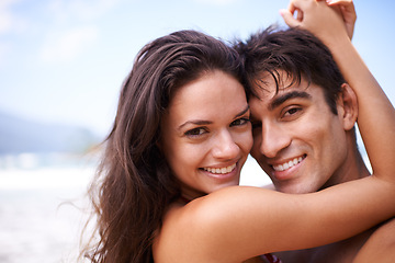 Image showing Hug, beach and portrait of couple on vacation, adventure or holiday for romantic travel. Happy, love and young man and woman on date by ocean or sea for tropical outdoor anniversary weekend trip.