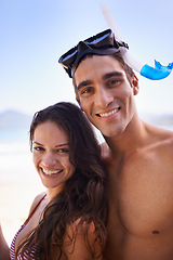 Image showing Love, smile and portrait of happy couple at ocean for tropical holiday adventure, relax or bonding together. Nature, man and woman on romantic date with beach, blue sky and snorkel vacation on island