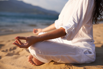 Image showing Yoga, hands and woman at beach in meditation for zen peace, wellness and mindfulness in outdoor nature. Lotus closeup, sand and calm person on holiday vacation for spiritual healing or mental health