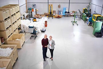 Image showing Factory, warehouse and portrait of business people with tablet for logistics, training and management. Mature man, woman and partnership with tech for planning, teamwork or distribution from above