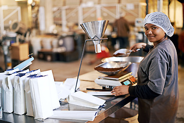 Image showing Manufacturing, worker and coffee beans packaging in factory with portrait, smile and production process. Business, woman and employee with bags, weighing tool and supply chain industry in warehouse