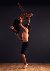 Image showing Modern dance, people and choreography in studio for training, competition and routine. Teamwork, movement and diverse young men for professional, performance arts and workout with dark background