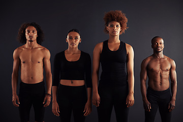 Image showing Performance, portrait and group of people, creative and artist of dance, moving and passion in studio. Black background, men and women with pride, confident and practice for ballet and stage