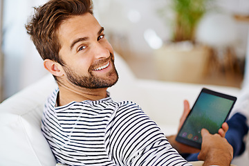 Image showing Relax, portrait or man with tablet for streaming movies or watching fun videos on a film website in home. Smile, online or happy person with technology to download on app or reading ebook on couch